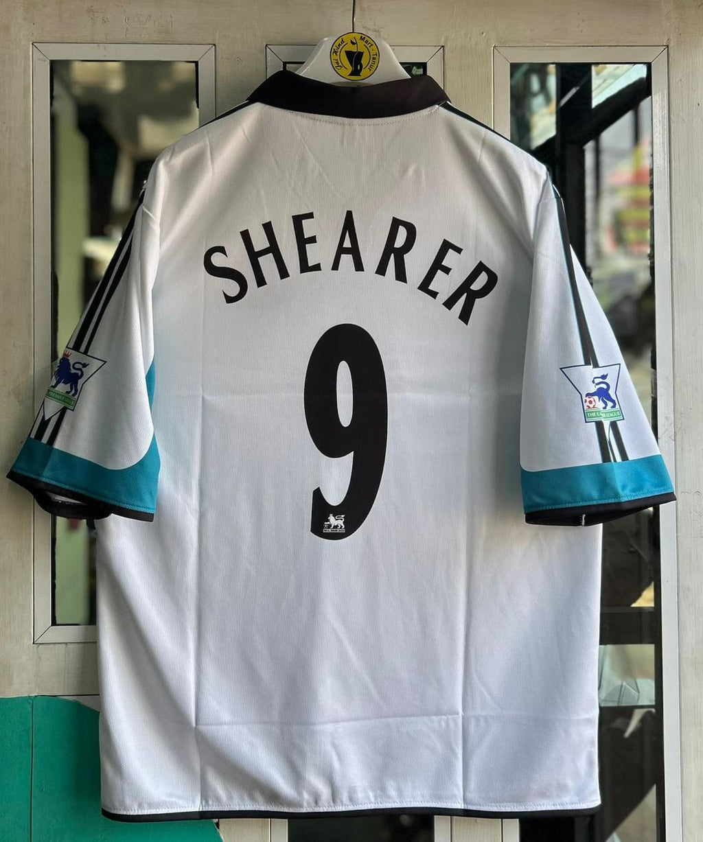 NEWCASTLE UNITED 1999-00 AWAY KIT. FIVESLEEVE POLO EMBROIDERY