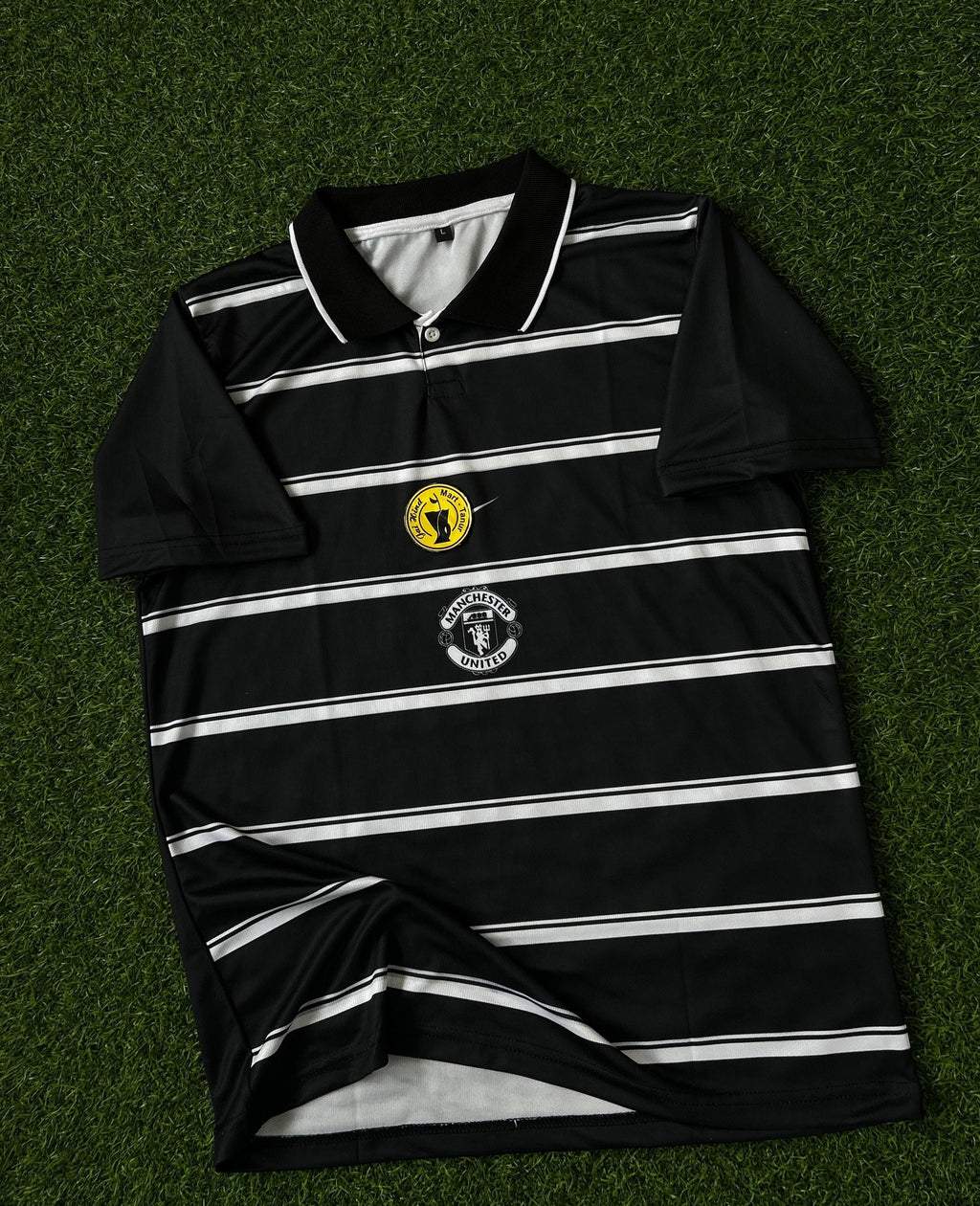 MAN UNITED RETRO KIT. HALFSLEEVE POLO SUBLIMATION
